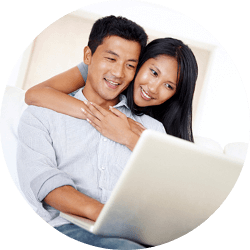 Couple looking at laptop together