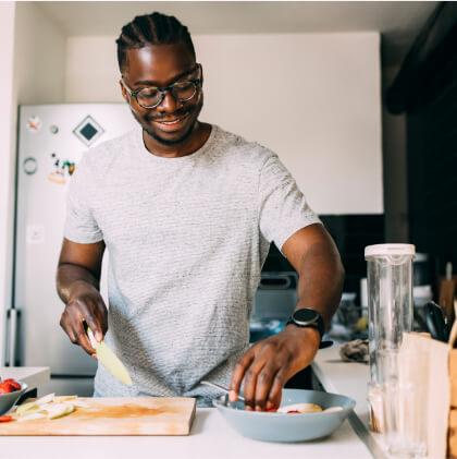 Man making food in kitchen 