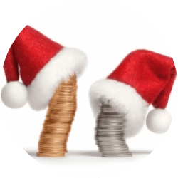 Stacks of coins with Santa hats