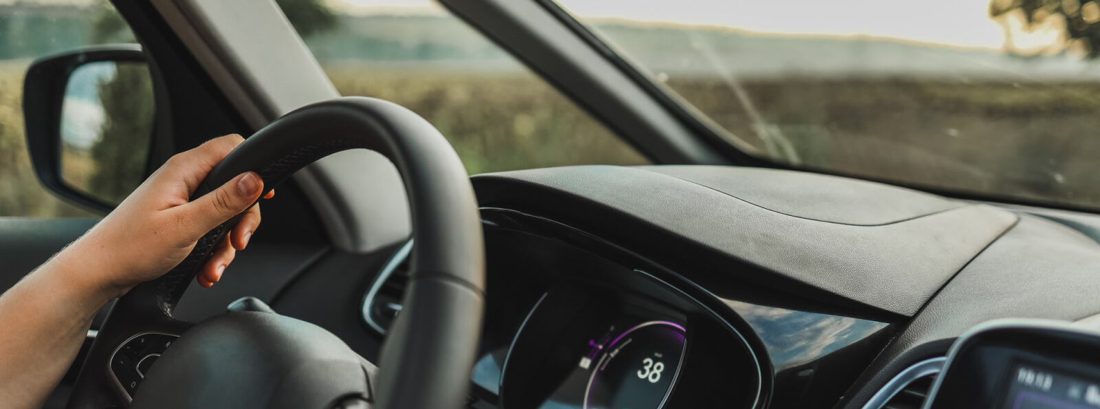 hands on a steering wheel